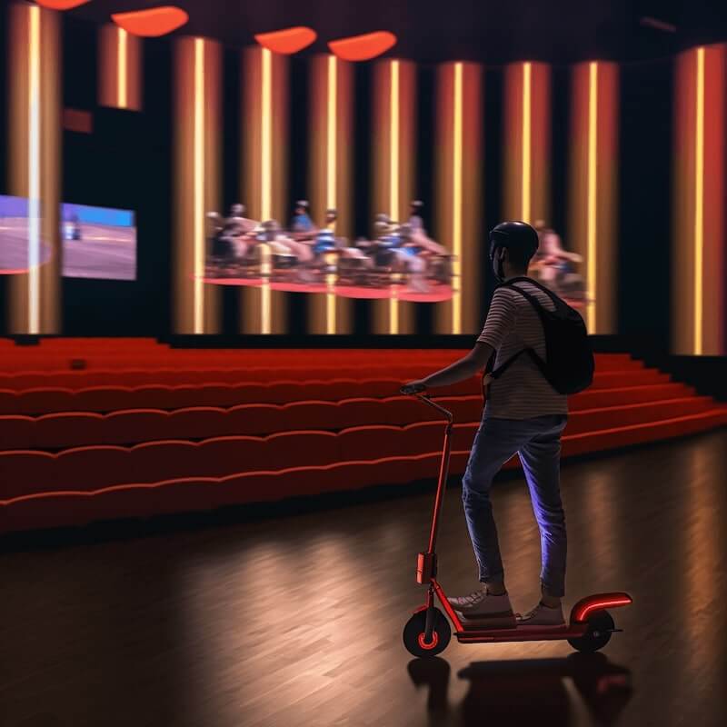 Can I bring an electric scooter inside a movie theater (like AMC) or a cinema